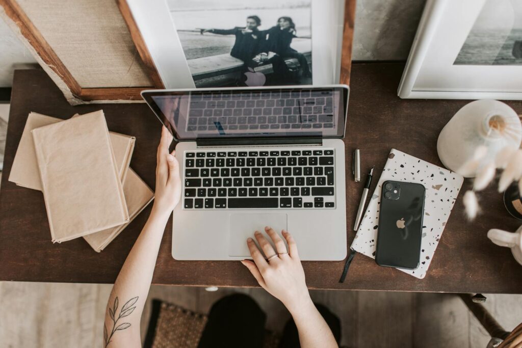 How to Create an Online Course and Make Passive Income 1 Unrecognizable lady using laptop in workspace