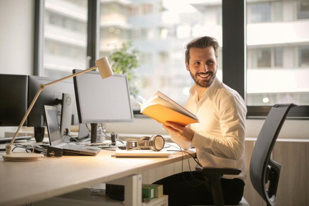 Get Paid to Shop: Start Mystery Shopping Now 1 Photo of Man Holding a Book