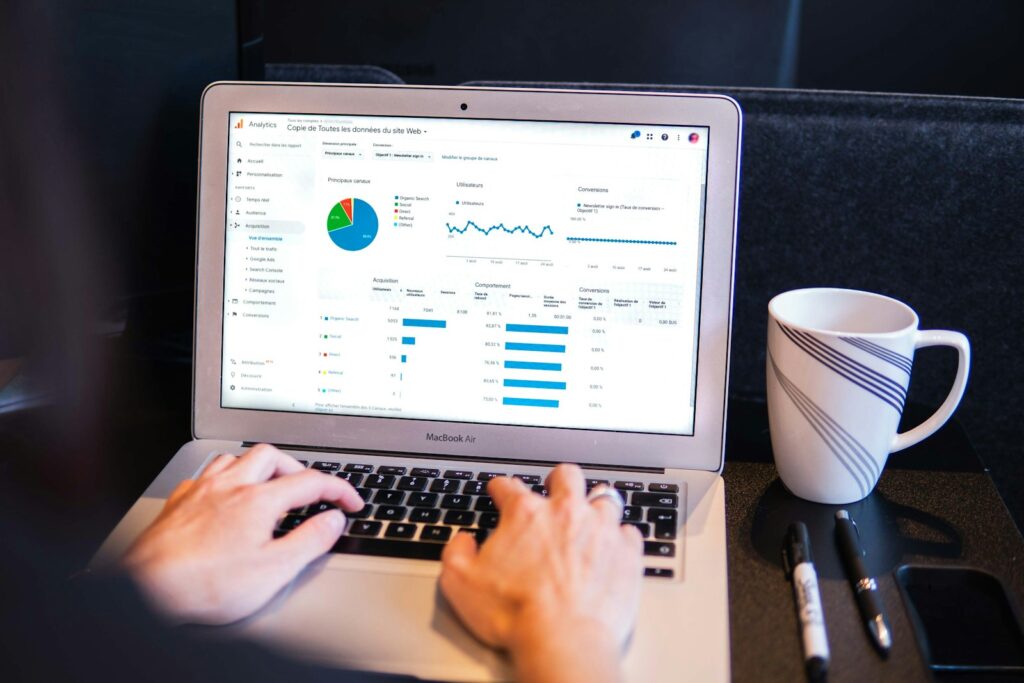 Remote Project Management Jobs You Can Do from Anywhere 1 person using macbook pro on black table