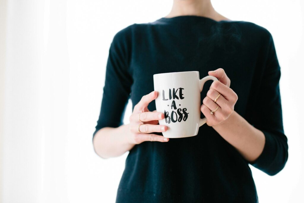 How to Publish an eBook and Make Your First Sale 1 woman holding white mug while standing